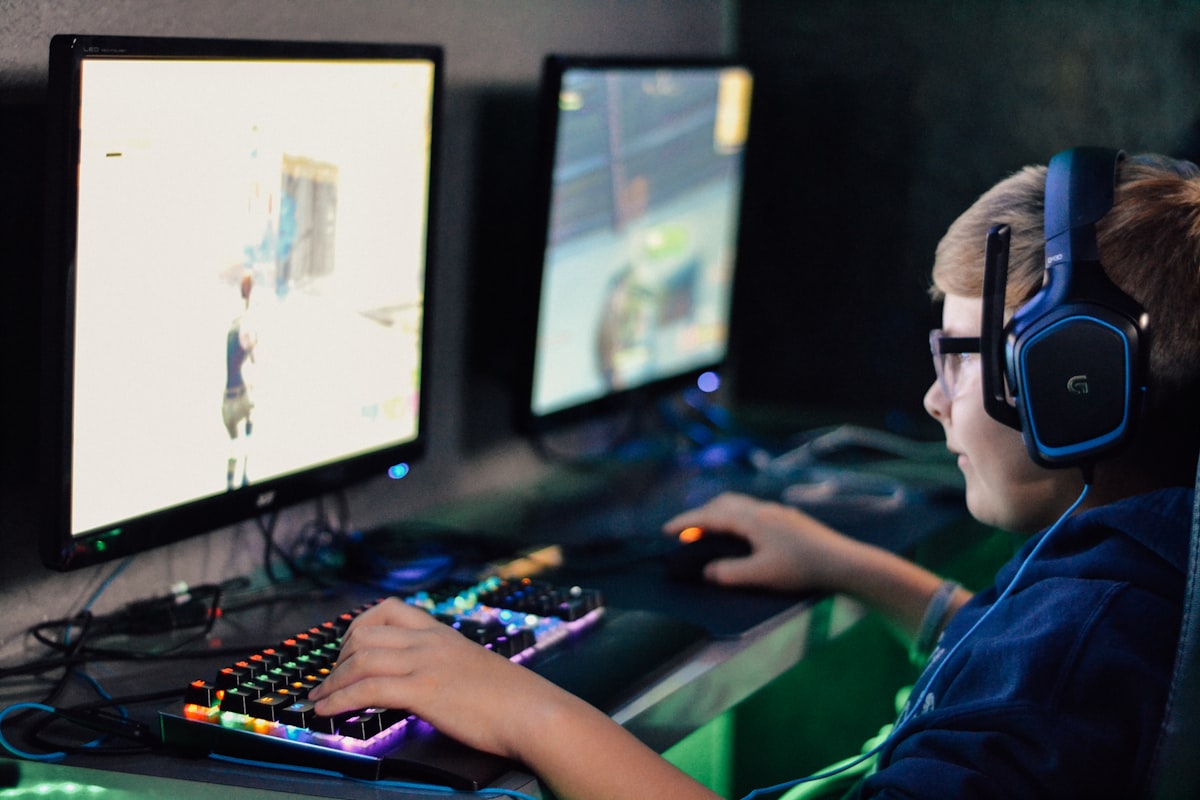 Player wearing a headset focused on gameplay